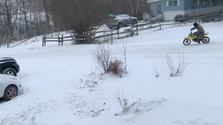 Snow fun on kids dirt bike