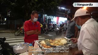 Noche Vive: Vendedor de arepas con lechera
