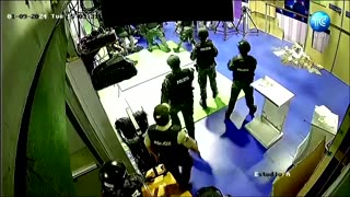 CCTV shows police entering Ecuador stormed TV studio