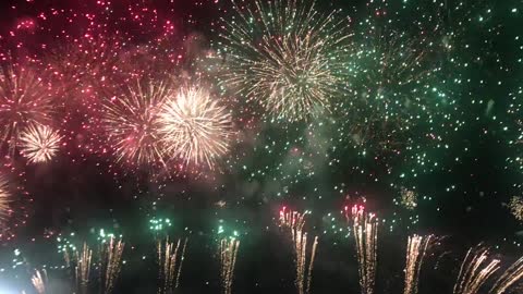 Bright Fireworks Display in the Night Sky