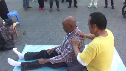 Luodong Briefly Massages Black Man In Plaid