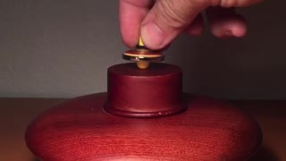 Watch as this crazy spinning top starts levitating