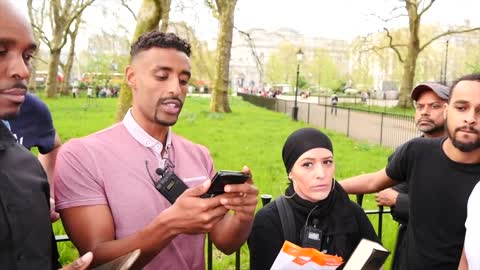 Muslim woman defends the position of women in Islam. DCCI Speakers Corner