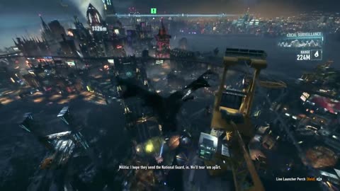 Batman does his iconic over-under bridge move.
