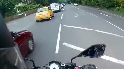 Six-day-old motorcycle crashes head-first into car