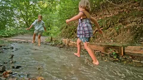 Children running in the water