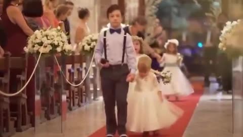 The groom surprised the bride by having her students with Down syndrome be the ring bearers 🥺