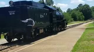 Locomotive No. 28 Unhooks from the train.