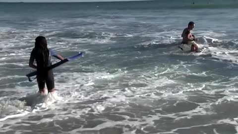 Surf's up! Pet goat rides the waves at California beach