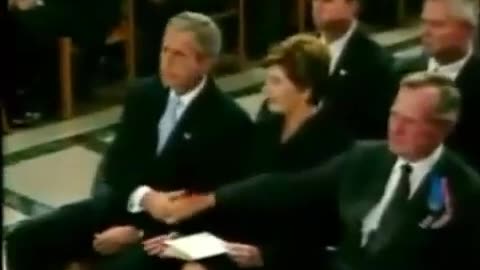 The Bushes perform a Masonic handshake during 9/11 Memorial Services