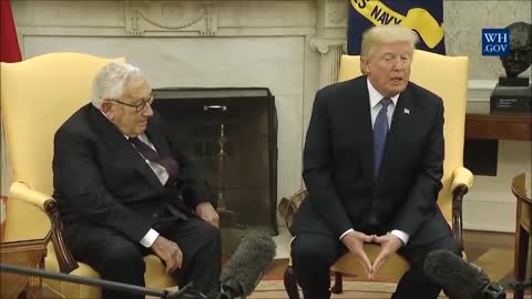 Trump showing Illuminati hand signal with Kissinger?