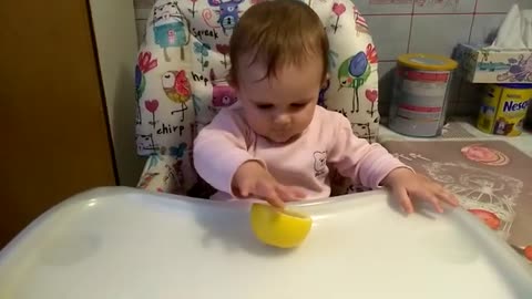 Cute_Baby_Tastes_Sour_Lemon_for_the_First_Time