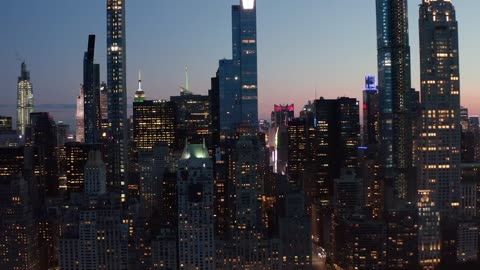 Zoom out shot of buildings and skyscrapers in NYC