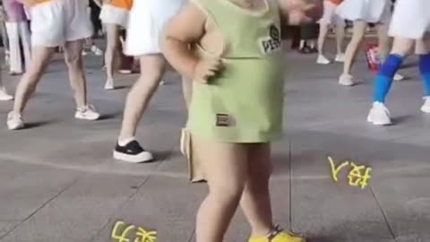 Asian child dancing