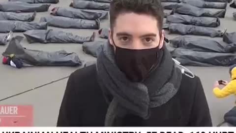 News station makes propaganda with actors in sleeping bags pretending to be killed by Russians