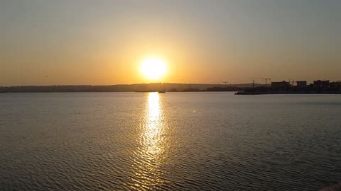 Beautiful sunset view at the sea with music