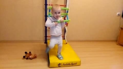 The baby came up with a new way to swing