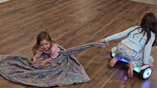 Sisters Take Hoverboard For a Spin