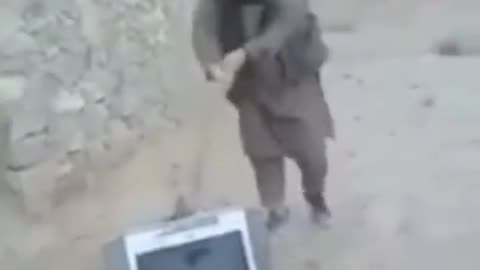 Taliban Smashing TV Because It's Made By Infidels