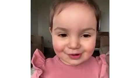 Adorable baby singing song with her heart