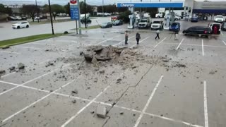 Lightning strike leaves behind 15-foot crater in Fort Worth parking lot