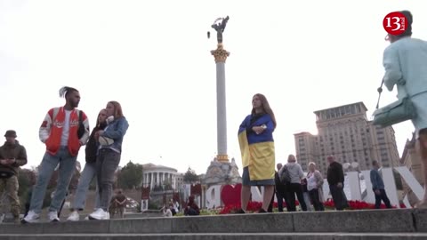 Ukraine's Maidan square stands still to pay tribute to killed soldiers