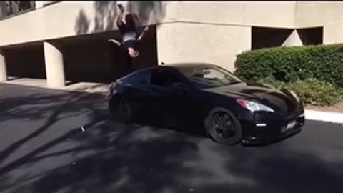 How did this guy do a flip on a wall over a car