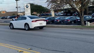 Man Jumps on Hood to Avoid Hit and Run