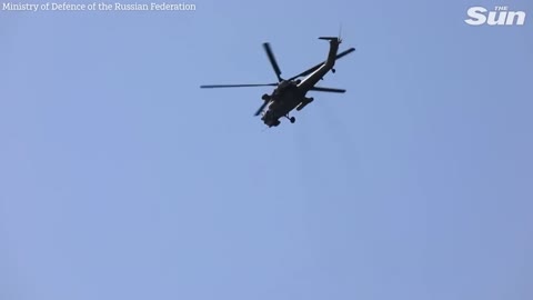 Russian pilots conduct aerobatics display in battle helicopters Moscow