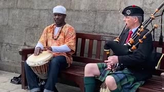 Epic street performance combines African & Scottish rhythm