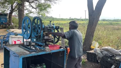 Hardworking Sugarcane Juice Maker