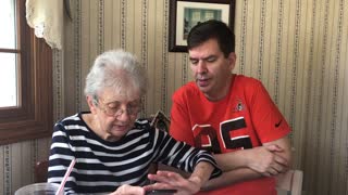 Grandma receives smartphone for the very first time