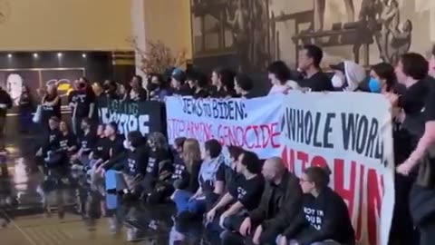 Pro-Palestinian protesters have taken over the NBC's Center lobby to disrupt President Biden