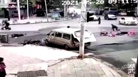 Entire road section explodes in Wuhan China sending passersby into air