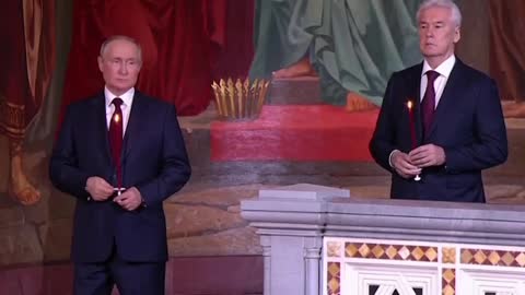 Putin attends an Easter mass conducted by the Russian Orthodox Church