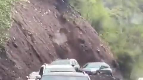 watch this unbelievable escape from a land sliding