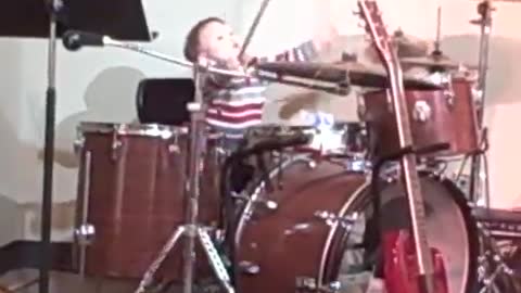 Kazou plays the drums