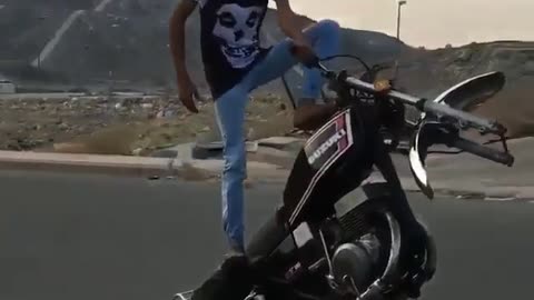 Teen Rides One-Wheeled Motorbike