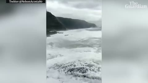 Giant waves destroy seafront balconies