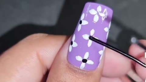 Purple white nail art