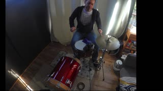 Groove 'in on the small drum set .