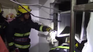 Firemen Burst Wall To Rescue Drunk Trapped In Vent