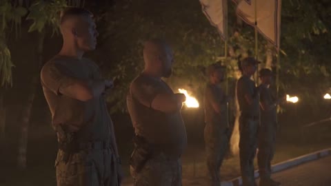 Ukraine: Azov Battalion ceremony with lit torches