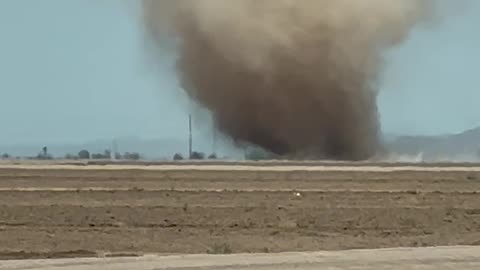 Driver Spots Huge Dust Devil in Field