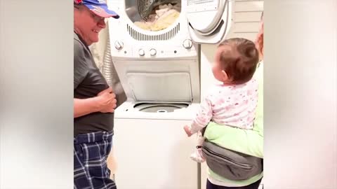Grandpa is a magicien and baby is laughing!