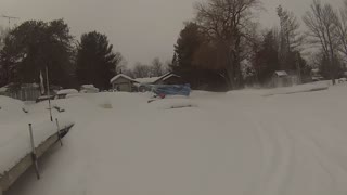 Kitfox Taxiing off lake in deep snow