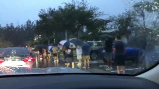 Florida Voters Not Letting Rain Stop Them!