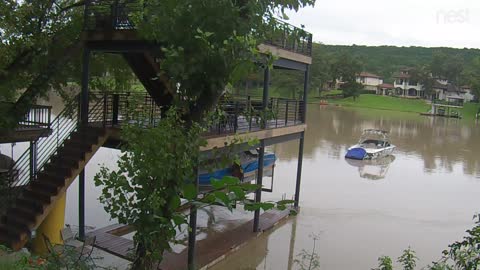 Man Swims After Boat During Austin Flood