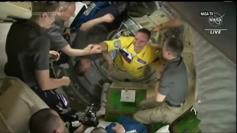 AP video - Cosmonauts wear Ukrainian colors on International Space Station