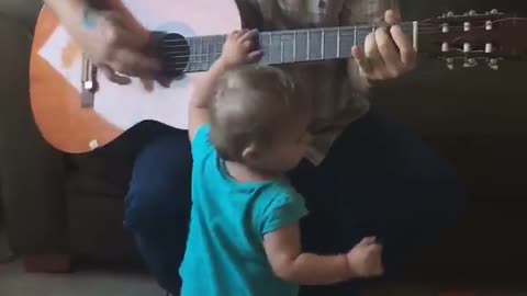 cute baby daddy guitar performance